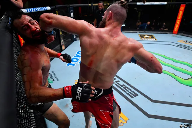 Jiri Prochazka KO's Dominick Reyes with a spinning, back elbow.