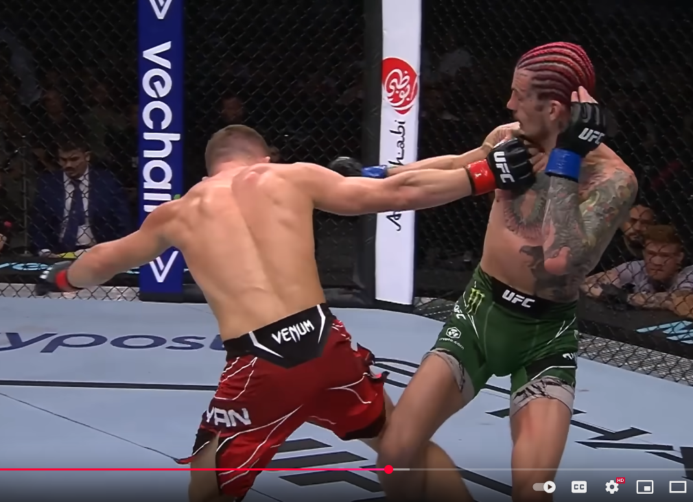 Petr Yan sweeping Sean O'malley with osotogari.